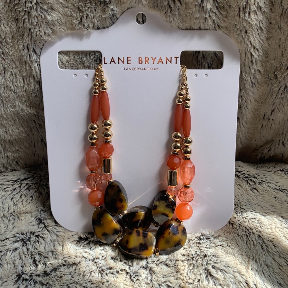 Coral and brown leopard beaded necklace